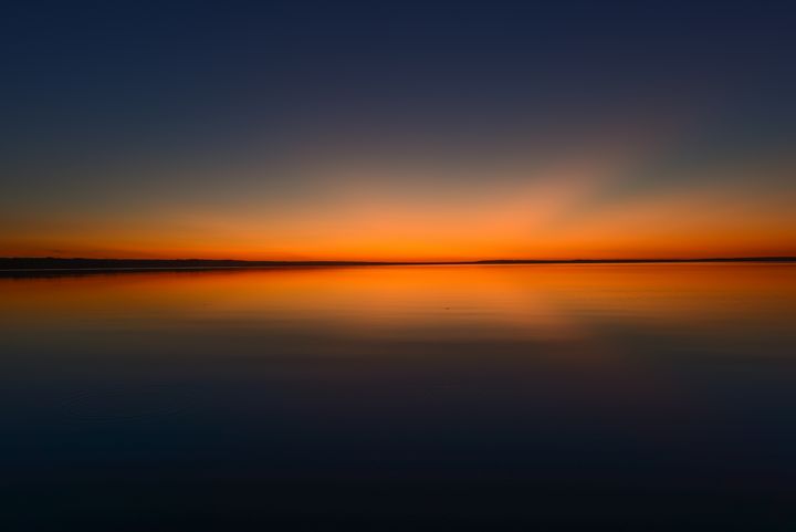 Calm evening scene with soft flowing curves and gentle twilight colours representing relaxed movement